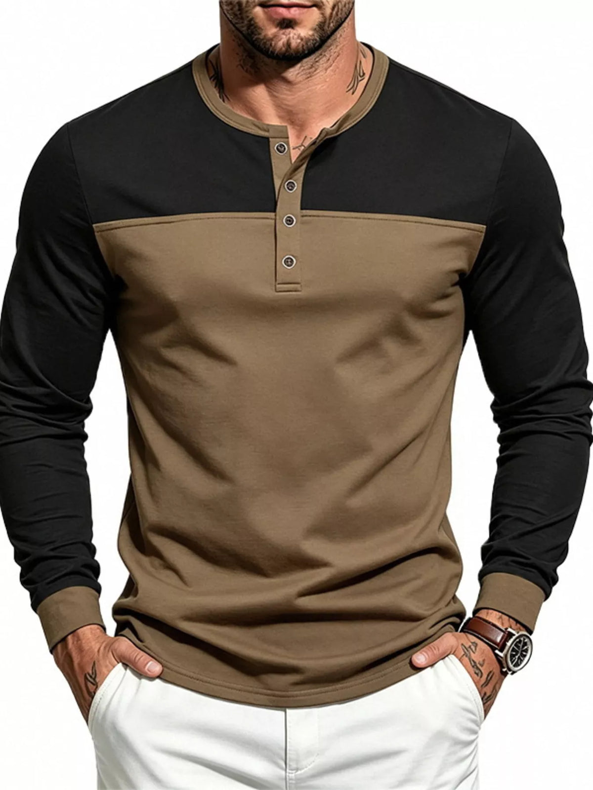 Man wearing a dark brown and black color block long sleeve Henley shirt, front view