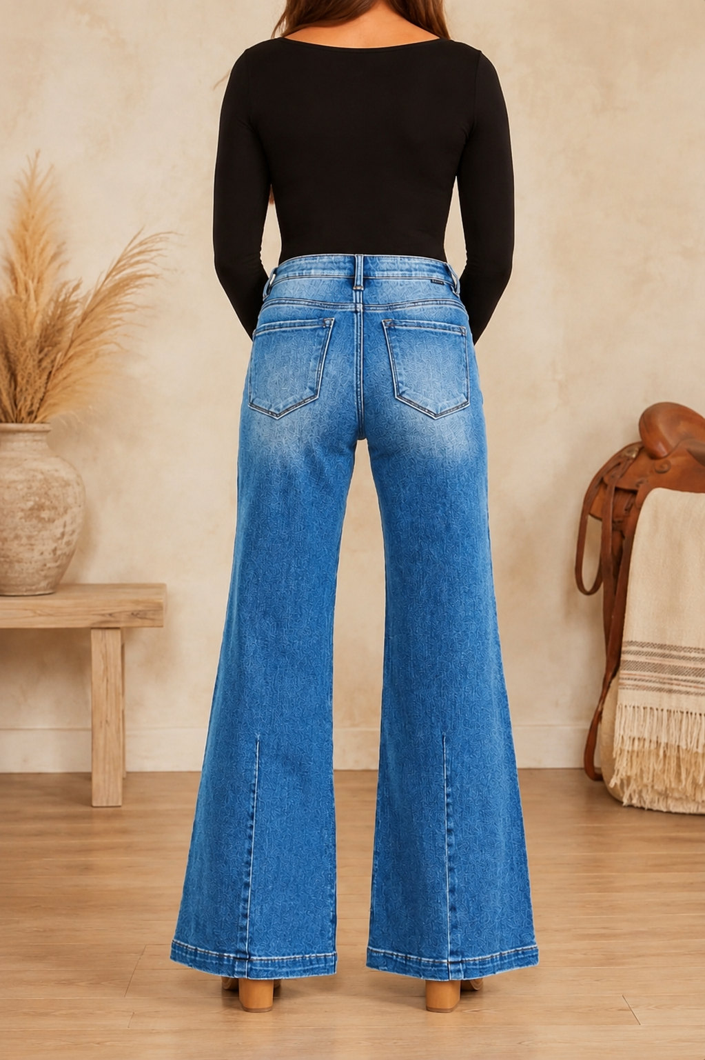 RISEN full-size medium-wash wide-leg flare jeans shown from the back