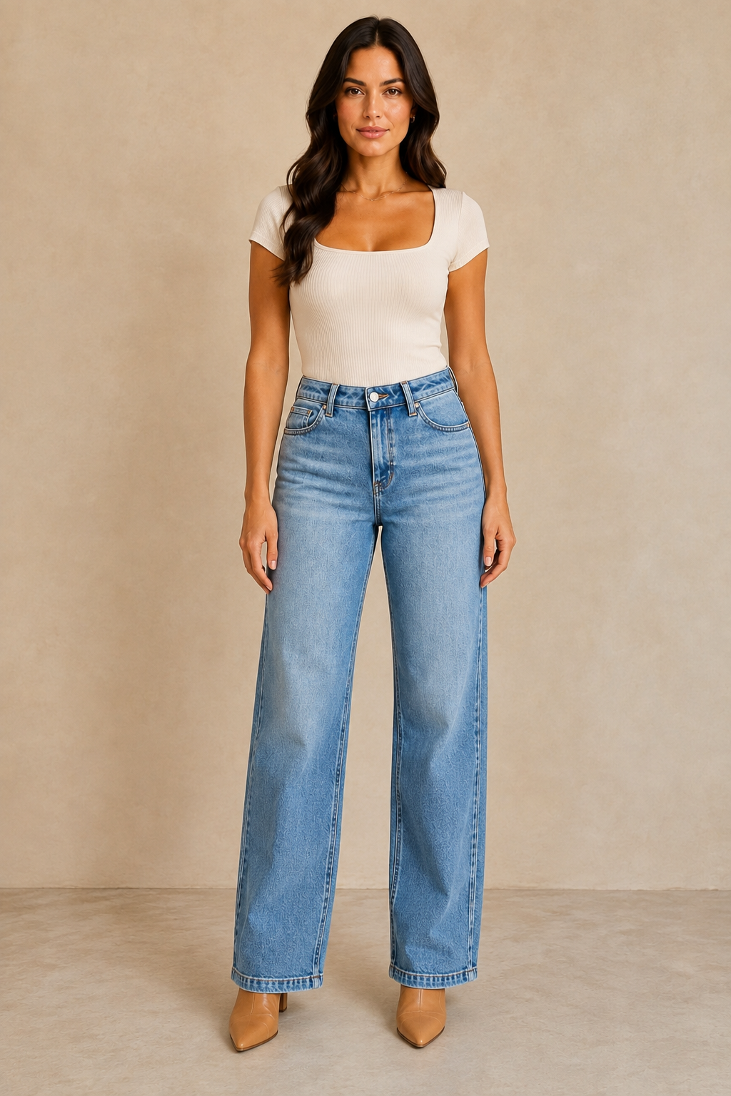 Front detail view of RISEN light-wash slouchy straight jeans showing the waistband and relaxed legs
