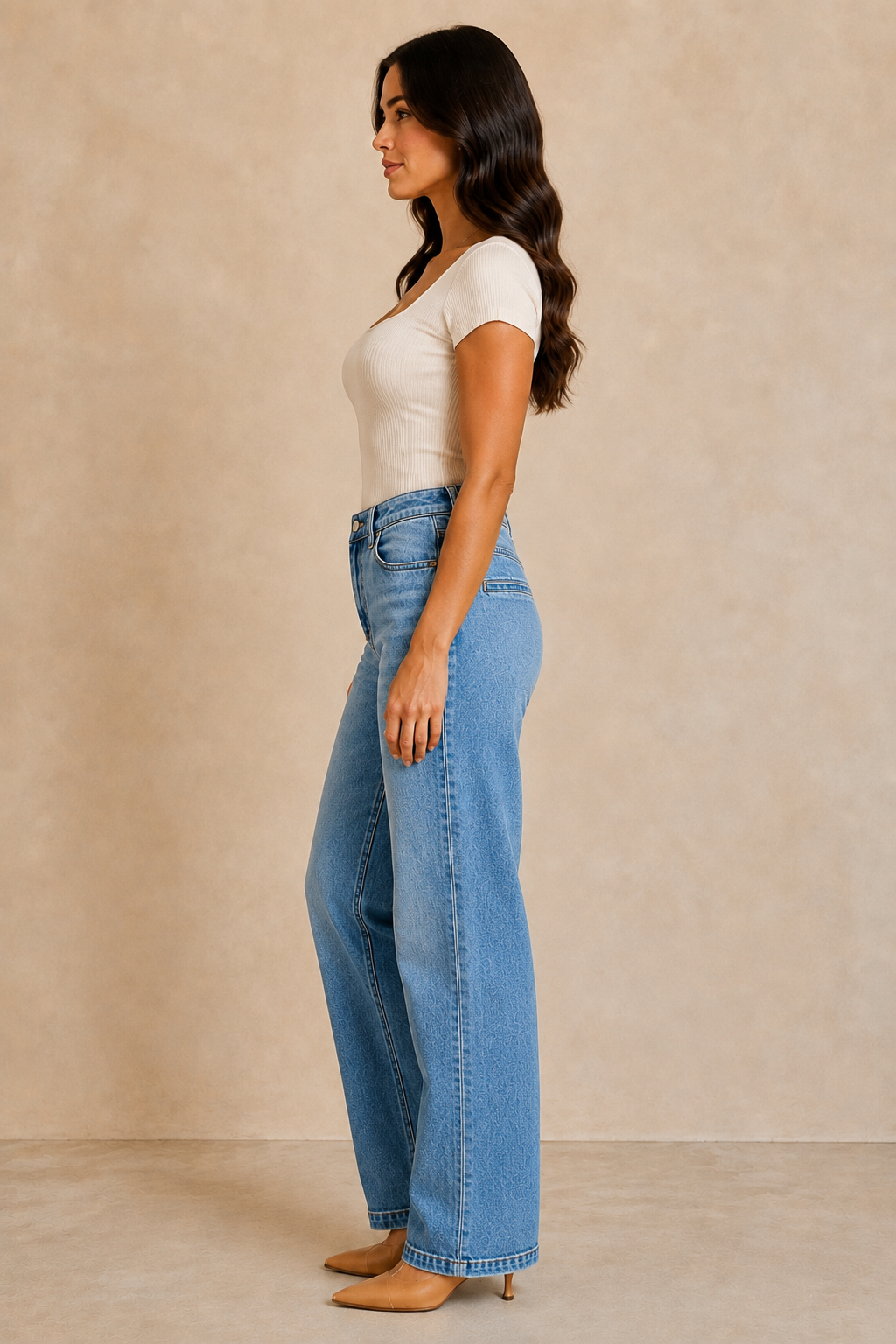 Side profile of RISEN light-wash slouchy straight jeans with a relaxed fit and welt back pocket