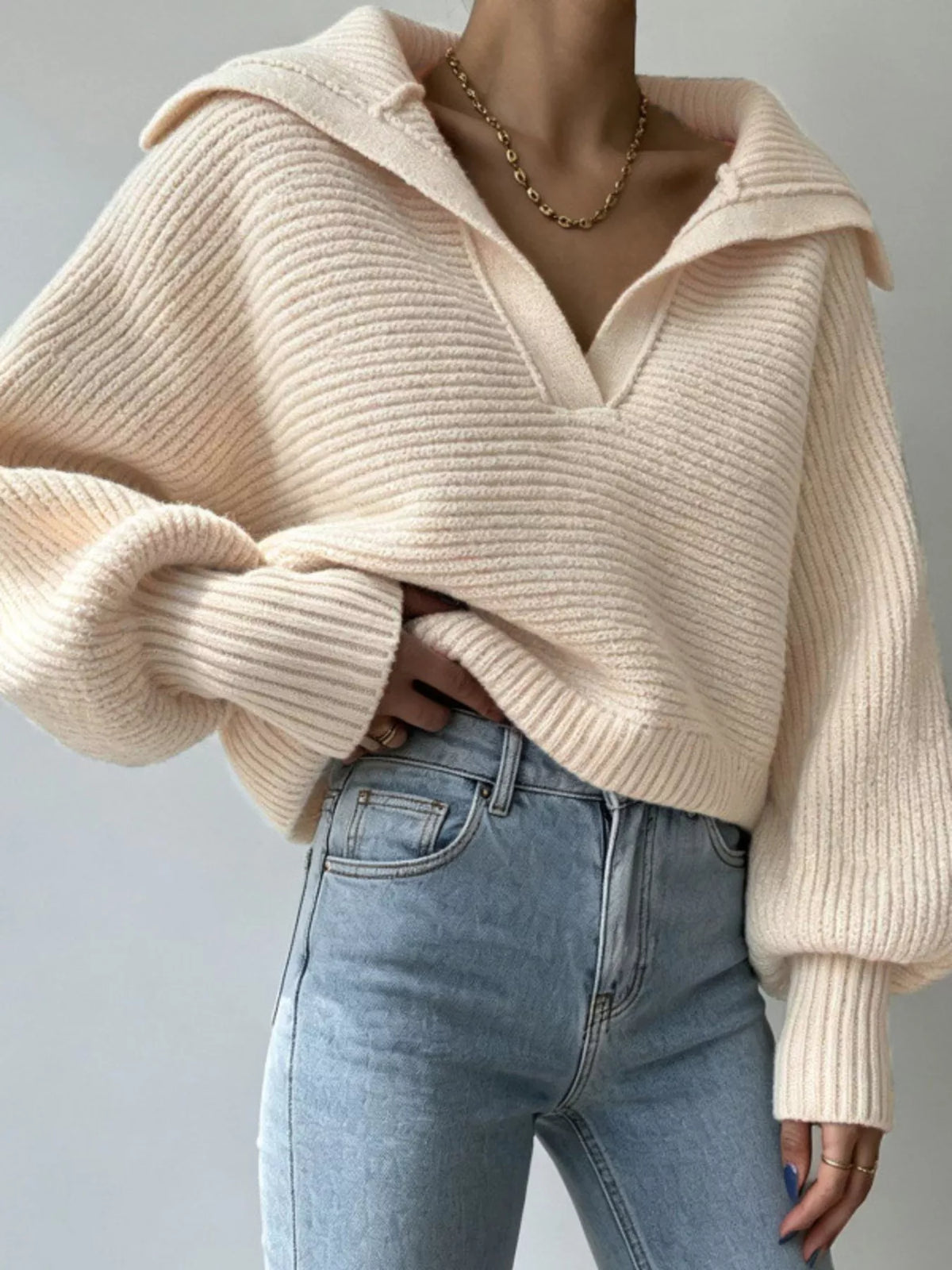 Woman wearing an Apricot oversized collar ribbed cropped sweater