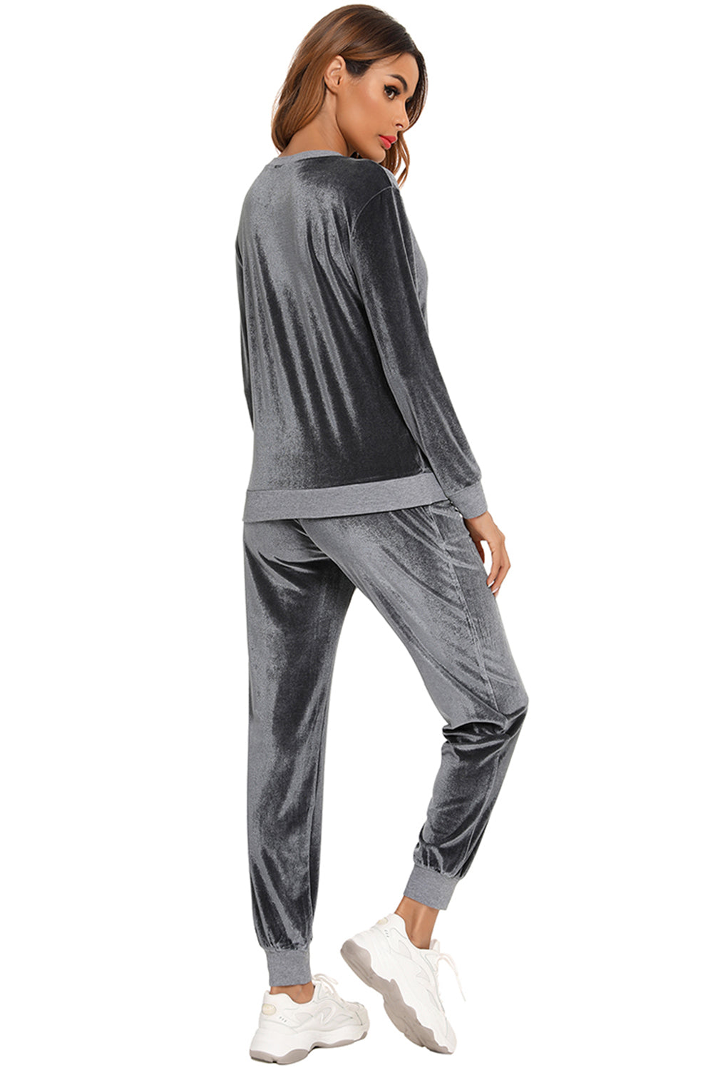 Woman wearing a charcoal round neck long sleeve loungewear set with matching pants, back view